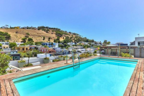 sleek, modern apartment, patio, secure parking